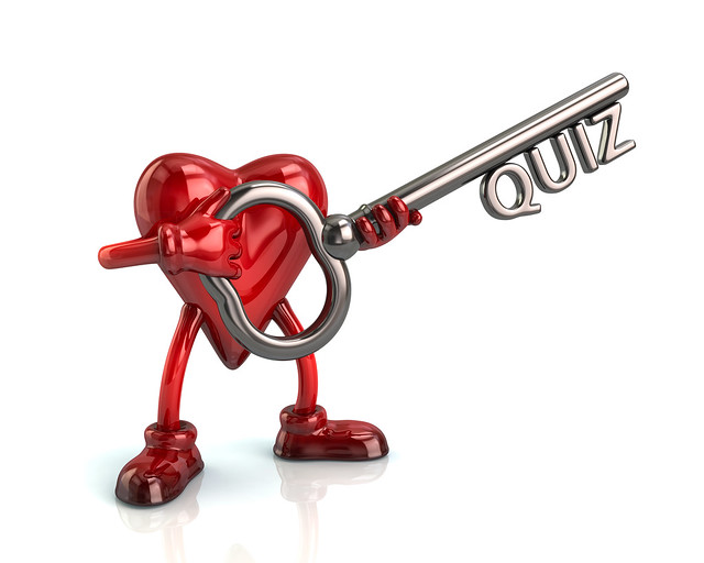 Cartoon heart character holding silver key with word quiz