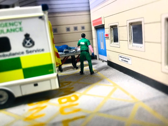 SAS Ambulance parked in Resus bay as crew remove patient from ambulance
