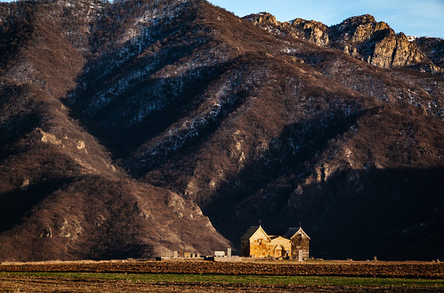 armenia armenie winter mountain shadows monastery sunset
