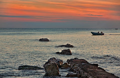 Trincomalee Beach sunriseFishing boats
