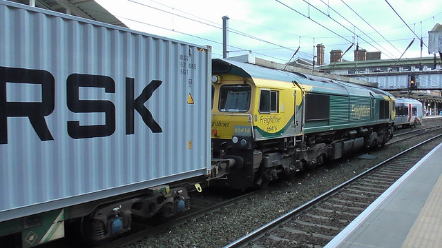 66 416 hauls an intermodal train through Ipswich Station.