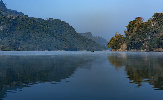 Local fishermen are seen fishing at Kaptai Lake with boat in winter