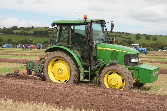 John Deere 5720 Tractor with a Kverneland 2 Furrow Match Plough