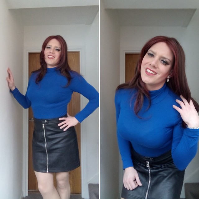 Blue top, leather skirt
