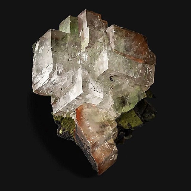 exclusiveminerals2 Rhombohedral calcite crystal cluster with inclusions of duftite, mottramite and hematite, Tsumeb, Namibia; Ex Tom and Gale Palmer Collection; 8.6 cm tall