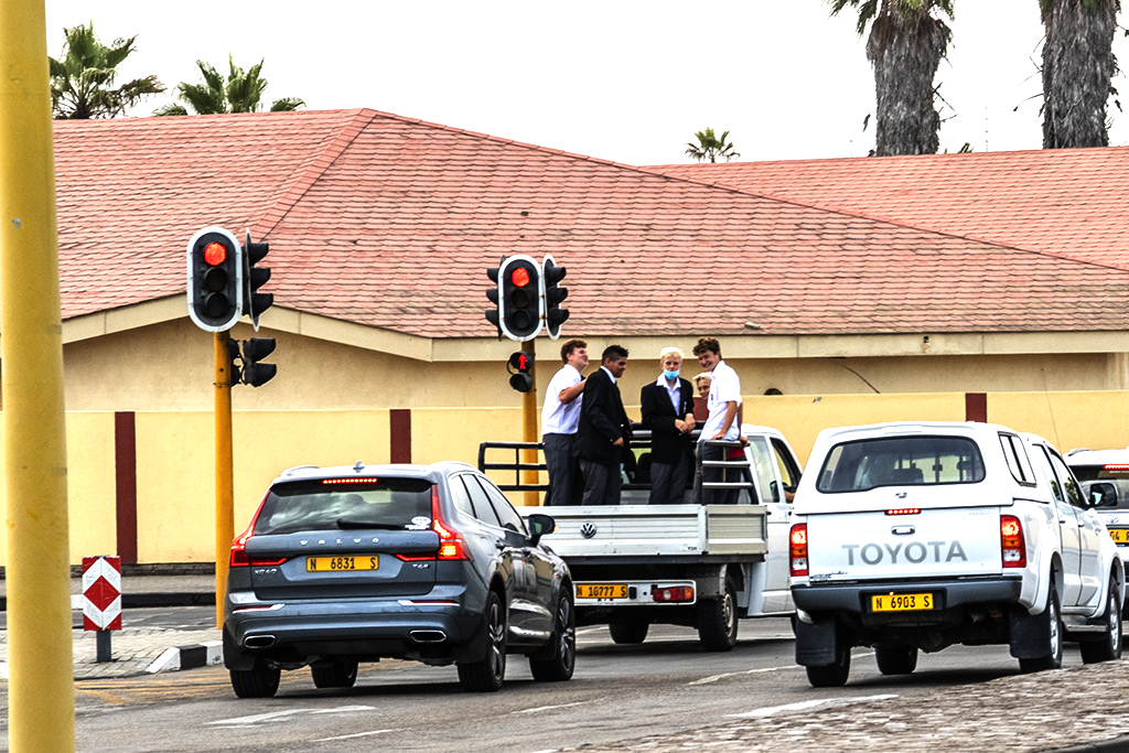 Four white boys and one colored boy in back of pickup truck on 2-16-22--Swakopmund copy
