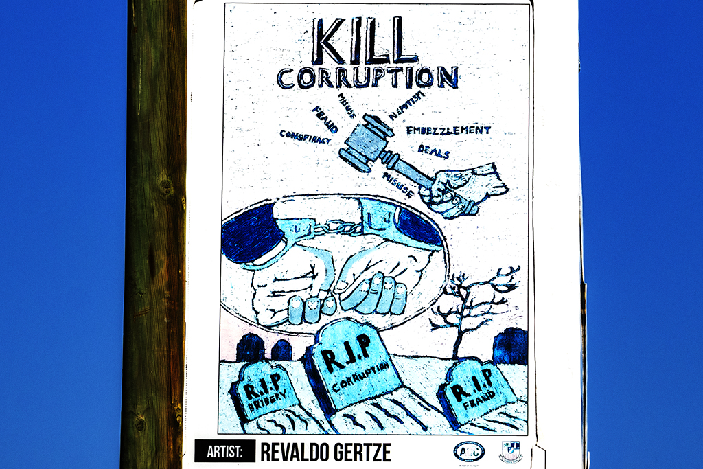 KILL CORRUPTION image beneath CITY CLOCK on 2-17-22--Swakopmund (detail) copy