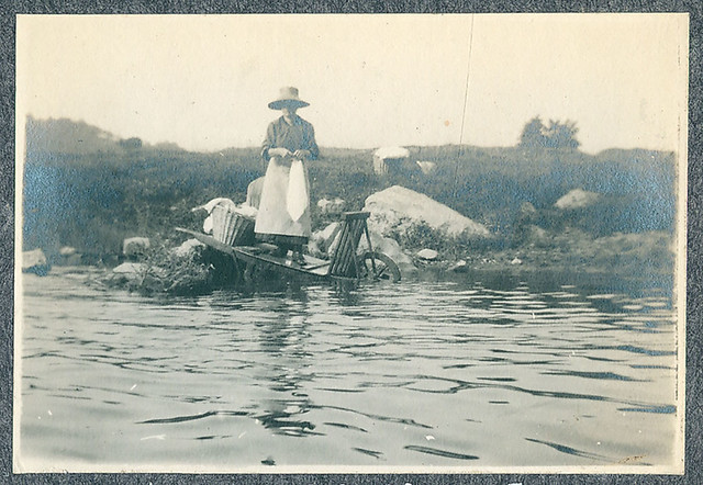 A woman is washing her clothes in the river Ourthe (Belgium, 1919)