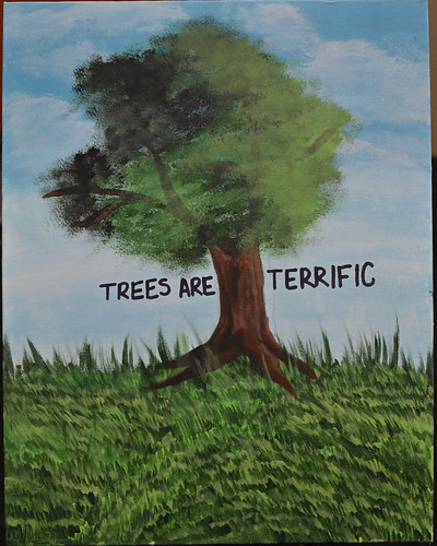 Photo of poster featuring tree artwork
