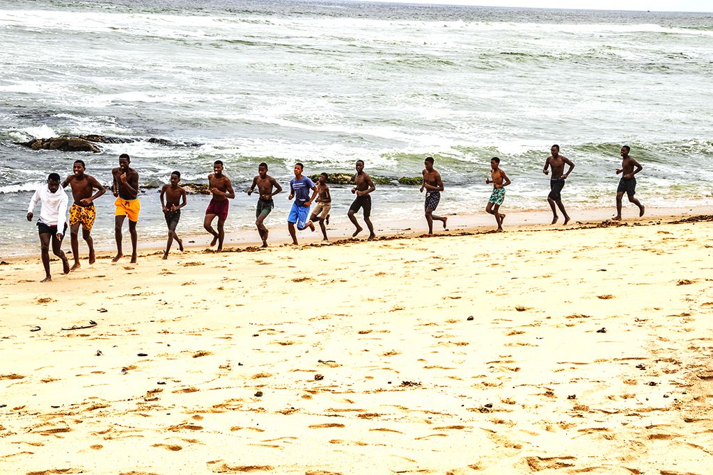 Boys and young men running on beach on 2-19--22--Swakopmund copy