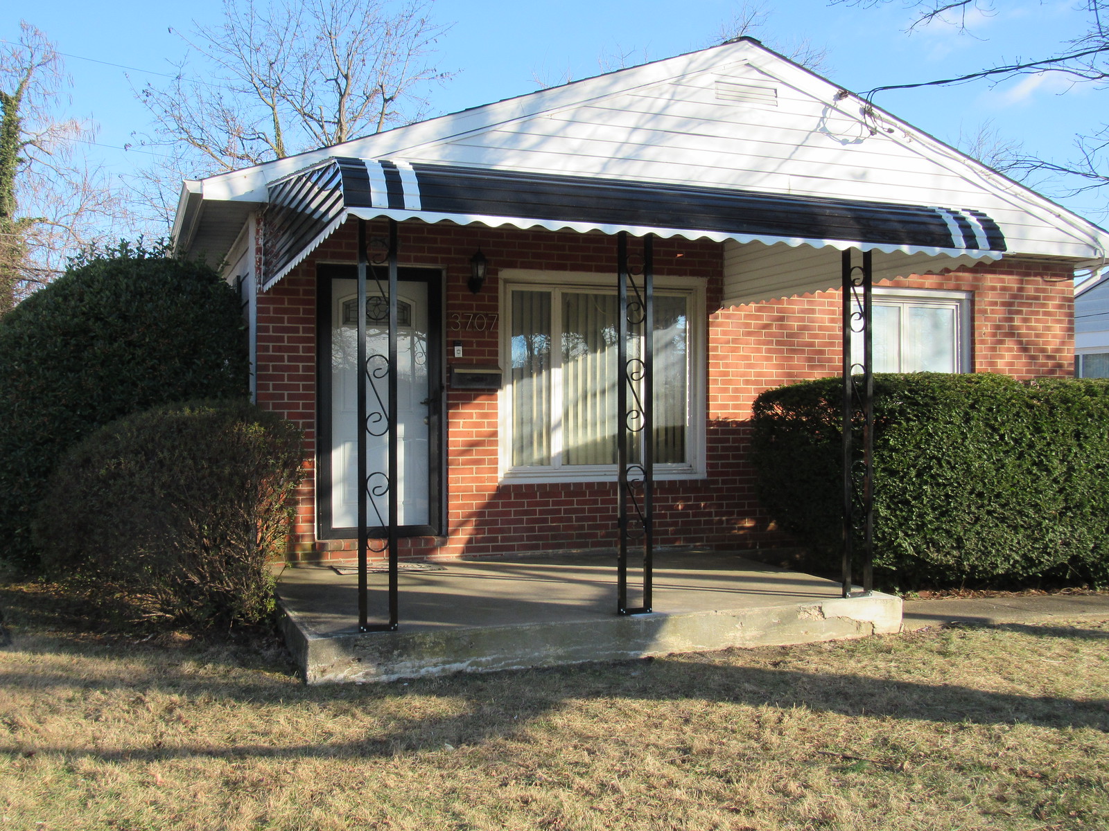 Black Aluminum Awning with Black Scroll Columns-Hoffman Awning