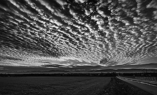 Dramatic altocumulus clouds at sunrise in Crozet, Pays de Gex, France.