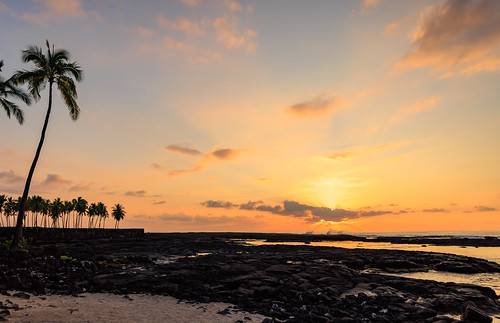 lavarock sand ocean sunset sky clouds palmtrees oceanspray waves captaincook hawaii unitedstates