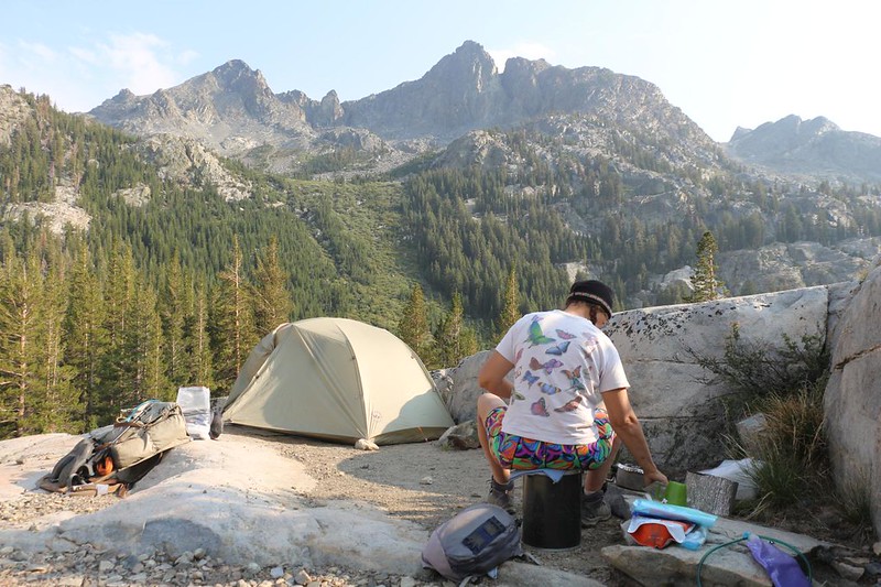 Vicki making dinner from our campsite along Shadow Creek on the JMT