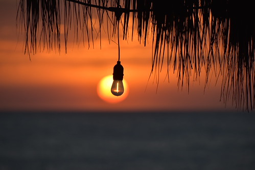 Sunset with Lightbulb at El Simple Beach Lodge, Las Peñitas, Nicaragua