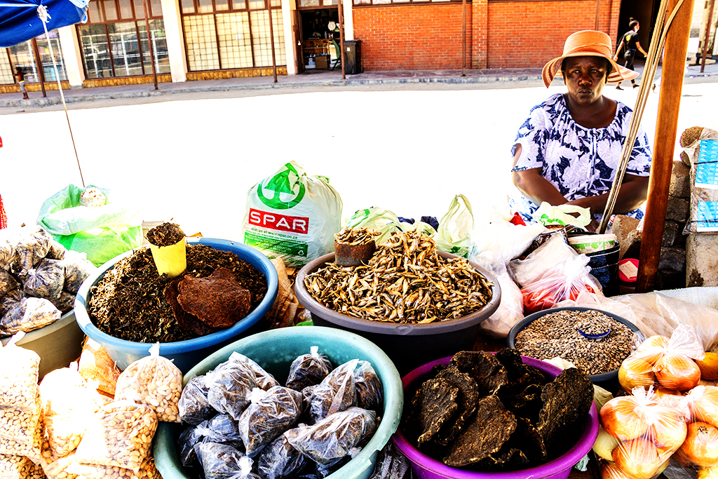 Woman selling dried fish, dried spinach and black eyed peas in Mondesa on 2-23-22--Swakopmund copy