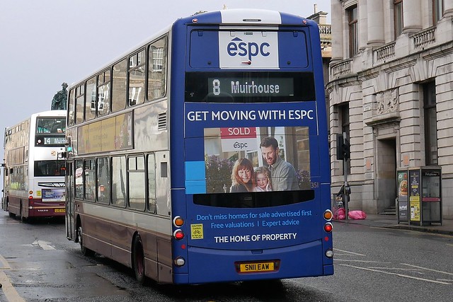 Rear of Lothian Volvo B9TL Wright Eclipse Gemini 2 SN11EAW 351, advertising Edinburgh Solicitors Property Centre, ESPC, operating service 8 to Muirhouse at Hanover Street on 24 February 2022.