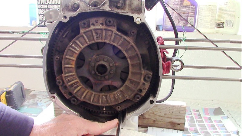 Using Screwdriver To Immobilize The Flywheel