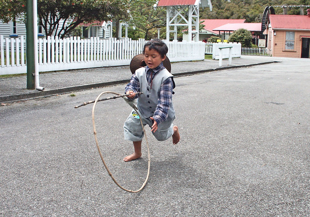 Boy with a hoop.