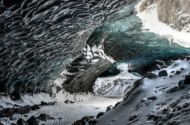 The inside of the Sapphire ice cave, covered with snow that blows in from the sporadic holes in the cave – photo by Mark Huy