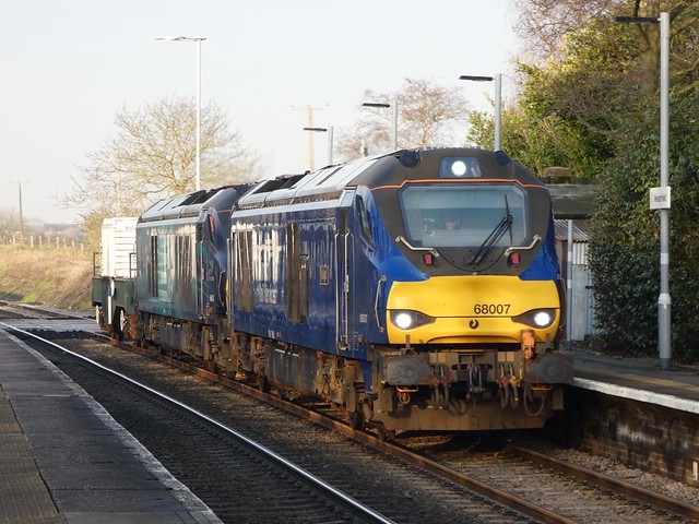 DRS 68007 and 68002 head through Westerfield working 6L70 3/3/22