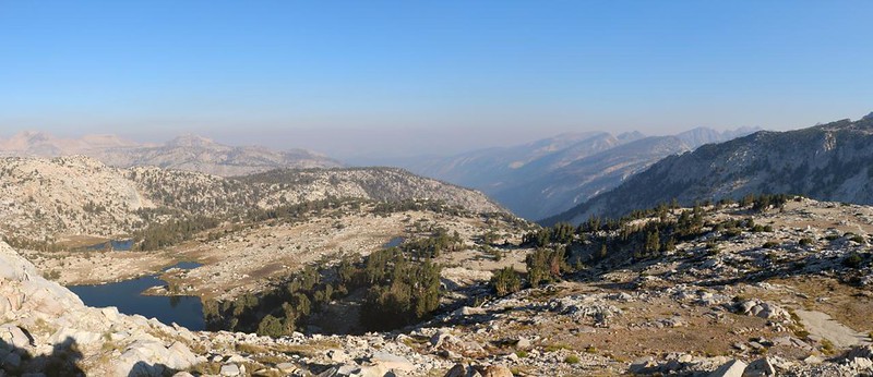 Hazy panorama view north from Silver Pass on the PCT, with Chief Lake and the Cascade Valley down below