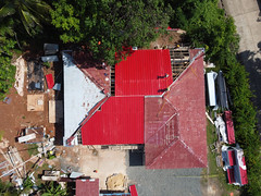 Aerial view of construction underway at a community health centre in Ngarchelong, Palau