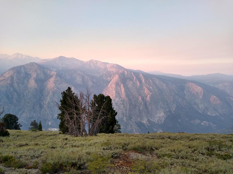 Dawn alpenglow across the Cascade Valley on Double Peak (10662 and 10649 feet elevation) from the PCT