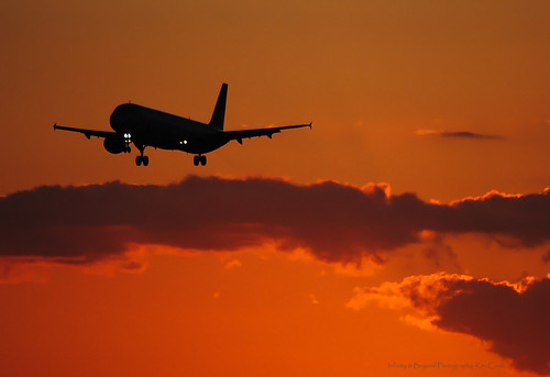 miami airport mia sunset arrival florida sky clouds airplane plane silhouette