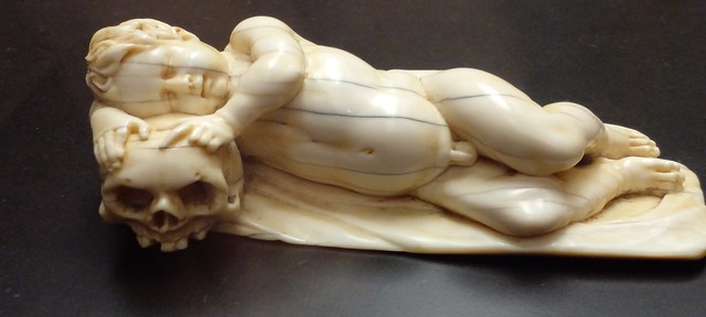 Schnütgen Museum: sleeping putto with skull (ivory)