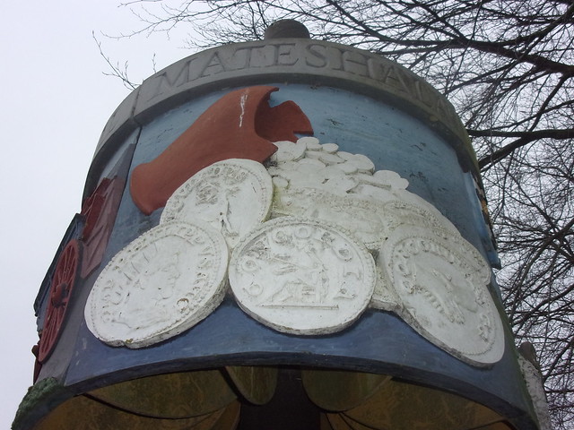 Cylindrical village sign