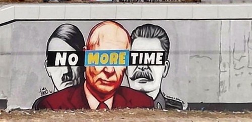 A mural of Putin, Hitler, and Stalin with a slogan " No More Time"
