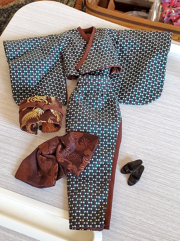 The beautiful kimono.  I think I need to get a delicate tea set for her.