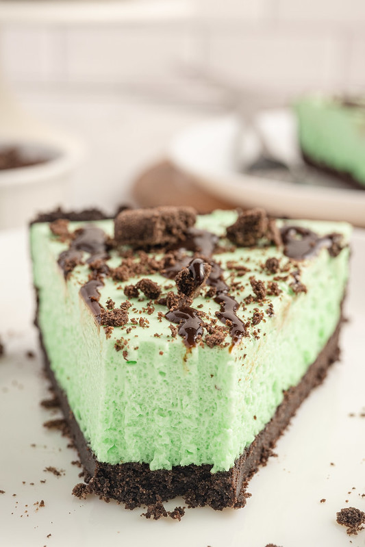 Slice of grasshopper pie with a bite taken out of it