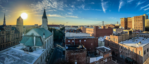 savannah georgia unitedstates st johns episcopal church buildings sunset ga skyline steeple clocktower clock building aerial view sun
