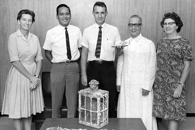 Ward and Micronesian Area Research Center (MARC), University of Guam. Form left to right: Marjorie Driver, Acting Director of MARC, UOG President Antonio C. Yamashita, Herbert T. Ward (Diver and author), Msgr. Oscar L. Calvo, and Emilie Johnston. LP835 Guam Public Library System