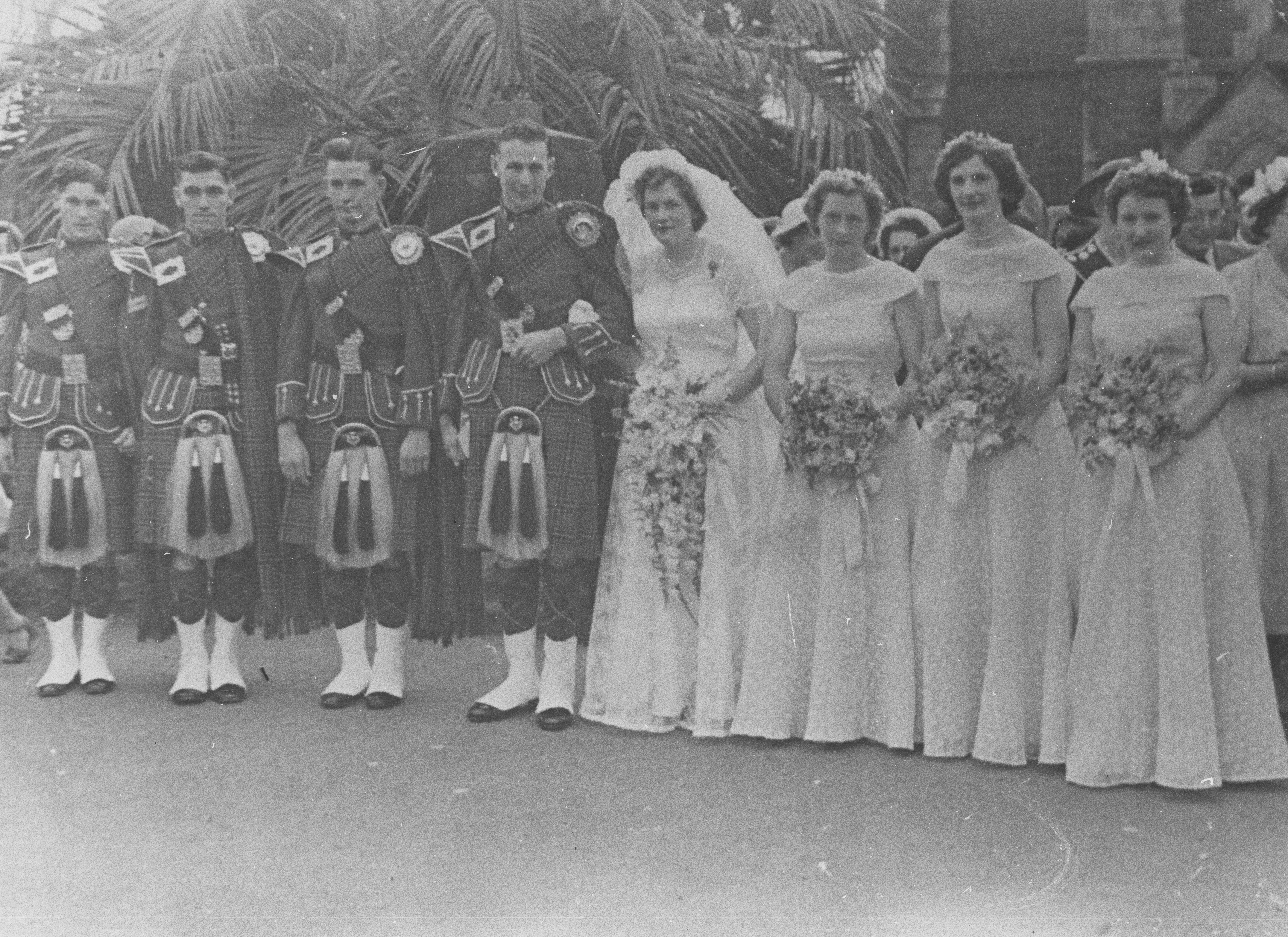 Wedding group outside a church, 1951
