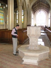 the late Tom Muckley inspecting the Wiveton font, 11th September 2004