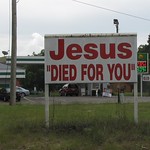 Jesus "Died for You" Photographed on North Carolina Highway 211 in Hoke County near Zack&#039;s Grocery and Grill and a sand pit. I am not sure the people who put up the sign understand the possible ironic use of the quotations marks.  