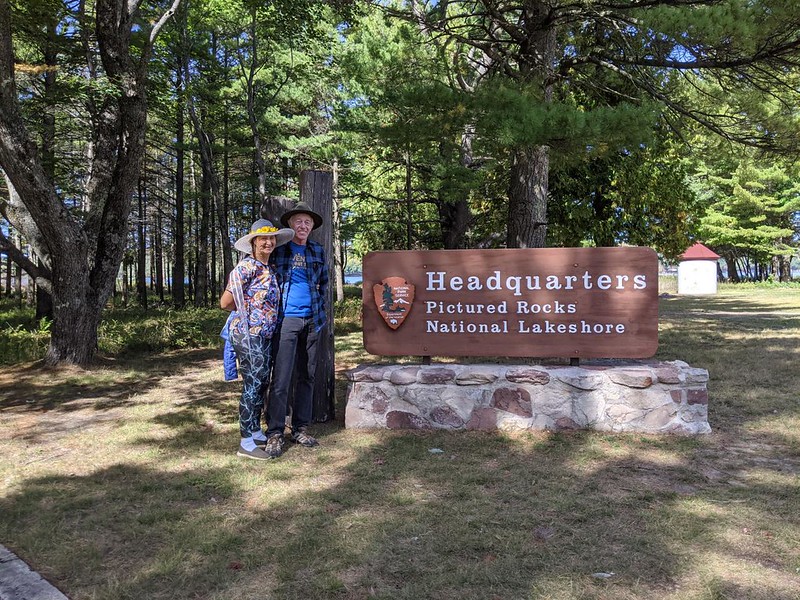 Vicki and I posing with the Pictured Rocks National Lakeshore headquarters sign