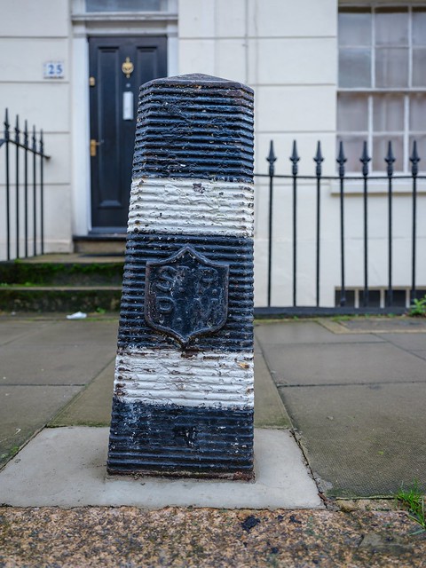 Camden, Camden Town, Georgiana Street: buried rectangular chamfered reeded bollard