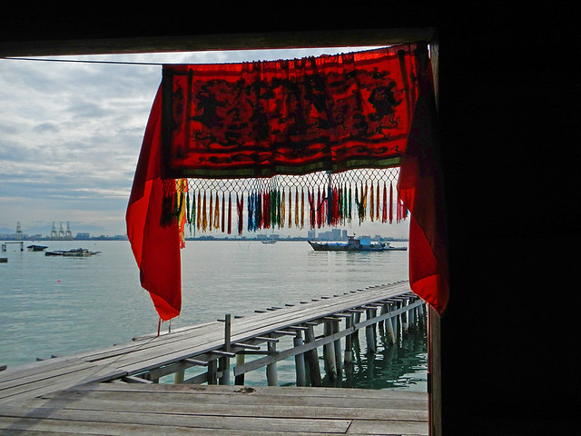 Red hanging on a building in the small village that lives on the Tan Jetty in Penang, Malaysia