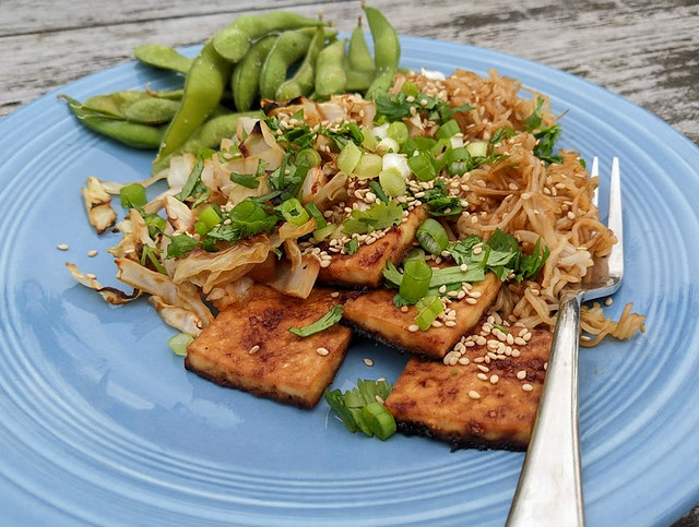 Spicy sweet tofu with crispy ramen noodles and roasted cabbage by Eve Fox, the Garden of Eating blog, Copyright 2022, all rights reserved.