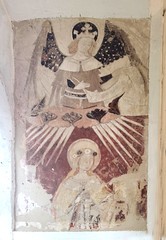 wall painting: female saint under an angel canopy
