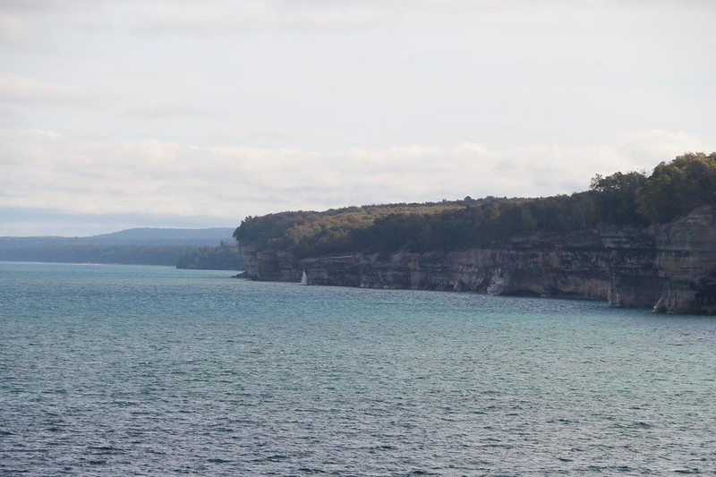 View east along the Lake Superior shoreline, with Spray Falls left of center, from the North Country Trail
