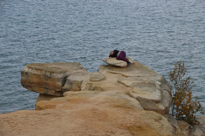 Vicki took a short nap out on the overhanging sandstone cliff at Grand Portal Point in Pictured Rocks National Lakeshore