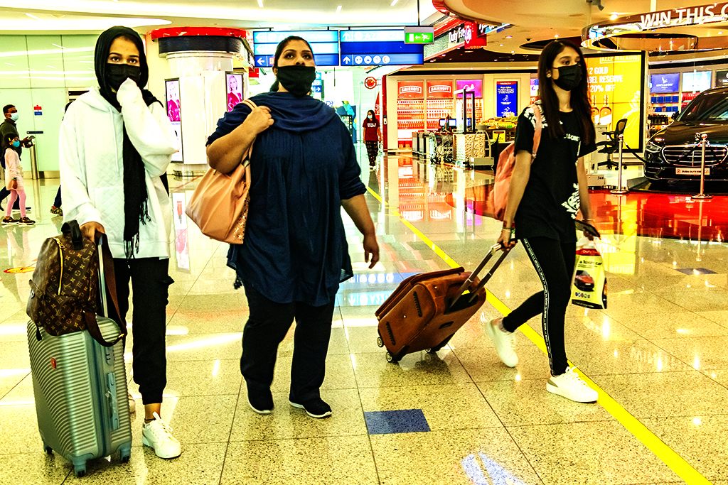 Three women at airport on 4-6-22--Dubai copy