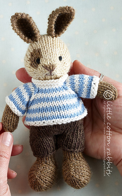 The Small Boy Bunny has a smaller version of the striped sweater and shorts as a bigger Boy Bunny.