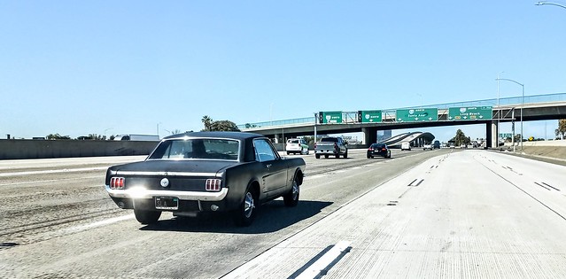 1966 Ford Mustang on I5 before I405