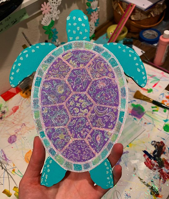 I’m nearly done with this lil turtle piece. Josh thinks I should paint scales on the aqua parts; I’m thinking just a dash of overall glitter. Any opinions?